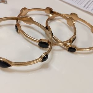Gold and black bangles